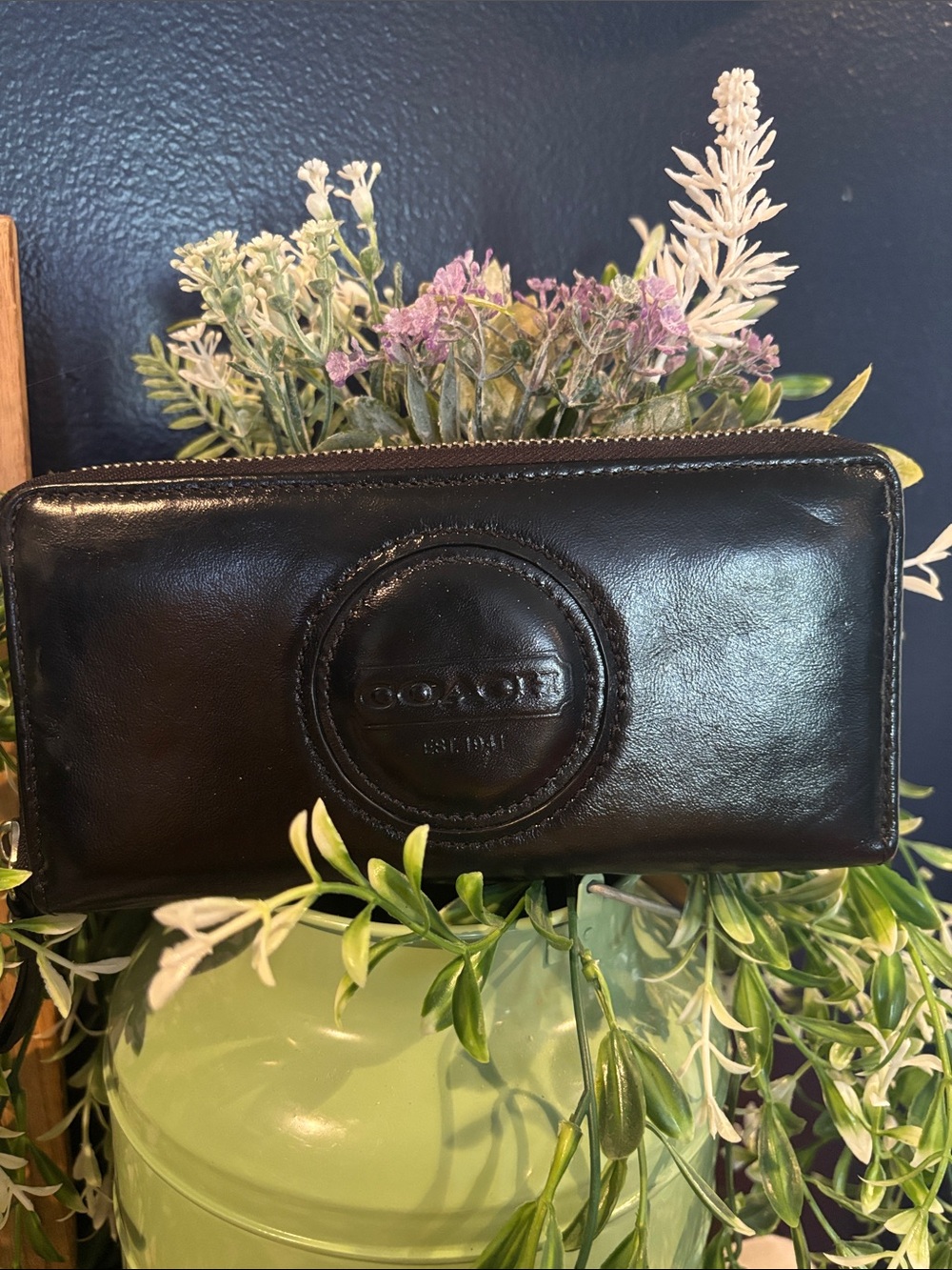 Coach Dempsey Black Leather Zip-Around Wallet with Embossed Logo